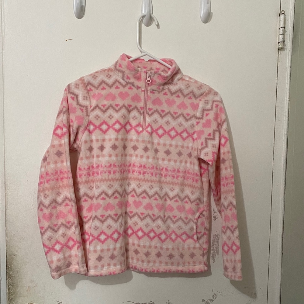Pink pull over sweater. Never used.